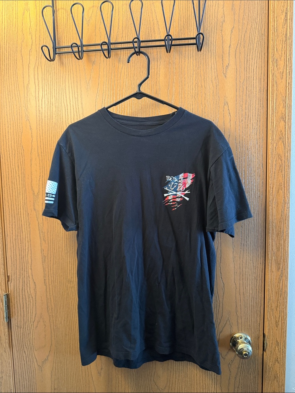 Men's Black Short-Sleeve Graphic Tee - Small Pocket Accent